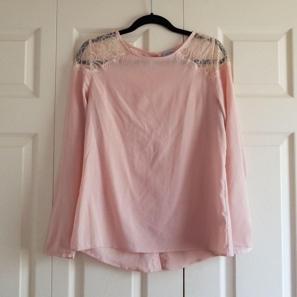 Pink bliuse with buttons down the back